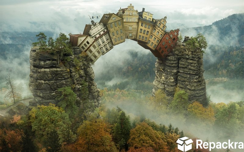 Creative photo manipulation artwork displaying surreal European houses bridging two rocky mountain cliffs