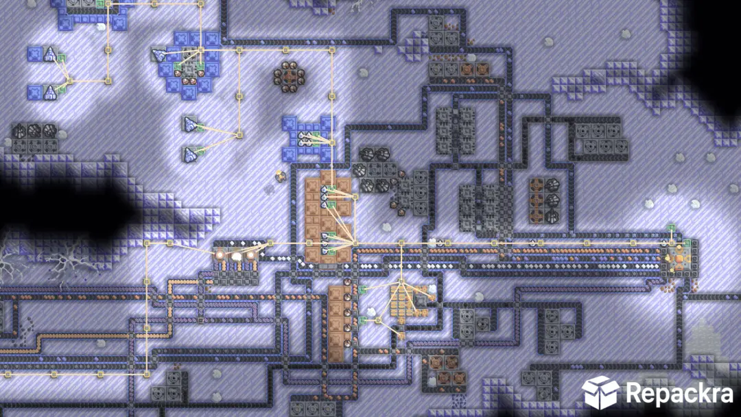 Mindustry top-down view of a frozen tundra factory layout with active assembly lines.